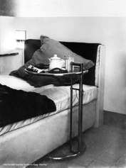 black and white image of a bed side stand