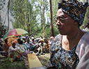 Woman kneeling down praying.